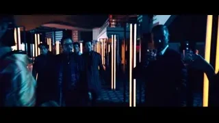 men in black robes walking down hallway — John Wick: Chapter 4
