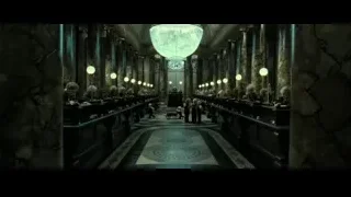people gathered in grand hall with chandelier — Harry Potter and the Deathly Hallows 2