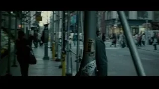 Man and woman walking busy city street at night — Limitless
