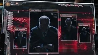 man in suit looking at large screen — The Avengers