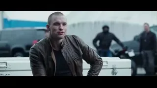 man in leather jacket by white truck — Deadpool