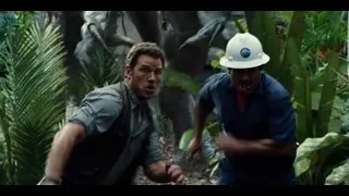 Two men in hard hats in jungle — Jurassic World