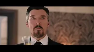 man in suit holding wine glass — Doctor Strange 2