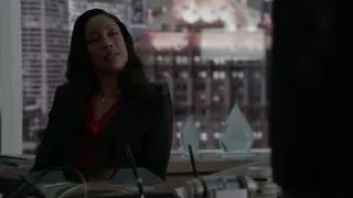 woman sitting at office desk city skyline — Suits