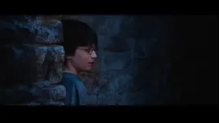 Harry Potter peeking from stone wall — Harry Potter and the Philosophers Stone