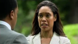 Woman talking to man in park — Suits