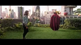 Man and woman conversing on rooftop garden — Doctor Strange 2