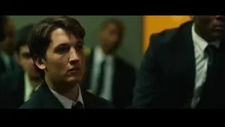 Man in suit looking off to side — Whiplash