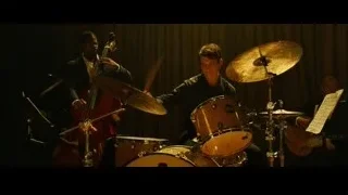 band performing on dimly lit stage — Whiplash