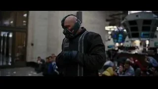 man in gas mask in large room — Batman: The Dark Knight Rises