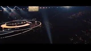 Crowd watching dancers on stage with bright lights — Now You See Me