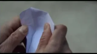 Hands holding paper with "I love you duck" — The Bear