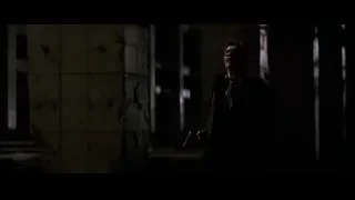 man with gun in dark room — Batman: The Dark Knight