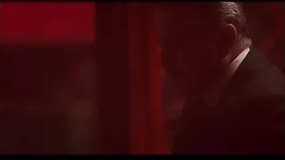 man in dark room with red lighting — Peaky Blinders