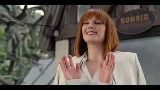 Red-haired woman by Sunrio building — Jurassic World