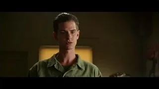 man in military uniform with American flag — Hacksaw Ridge