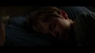young man sleeping in bed — Batman: The Dark Knight