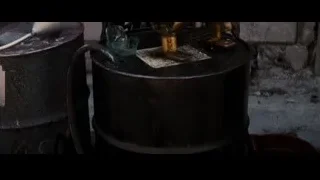 black metal barrel with machine — Batman: The Dark Knight Rises