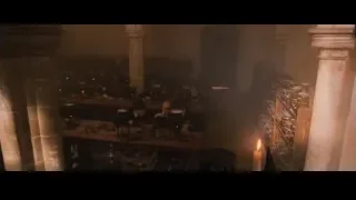 Man in robe holding candle — Harry Potter and the Philosophers Stone