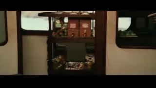 elderly woman standing behind wooden door — Harry Potter and the Philosophers Stone
