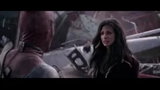 Woman looking at masked man in rubble — Deadpool