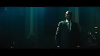 Man sitting at desk in office — John Wick: Chapter 4