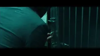 person writing on metal door — John Wick