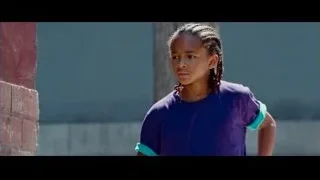 young girl with braided hair at wall — The Karate Kid