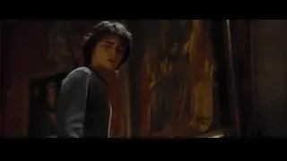 young man standing in dimly lit room — Harry Potter and the Goblet of Fire