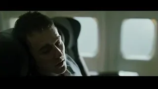 man in airplane seat looking out window — Fight Club