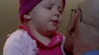 baby in pink beanie with man — Breaking Bad