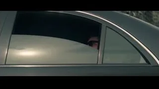 man in car wearing sunglasses — The Amazing Spider Man 2