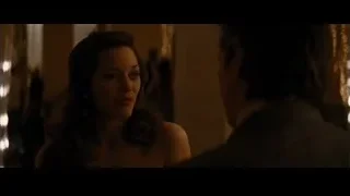 woman and man by a mirror — Batman: The Dark Knight Rises