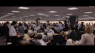 Man speaking to office crowd with microphone — The Wolf Of Wall Street