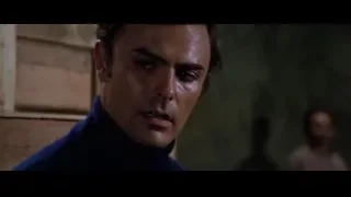 man in turtleneck in dimly lit room — Bruce Lee: Enter The Dragon