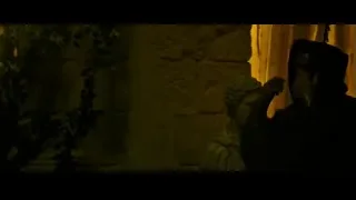 man standing in dimly lit room — Gladiator 2