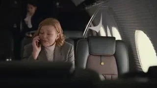 Woman talking on phone in airplane — Succession