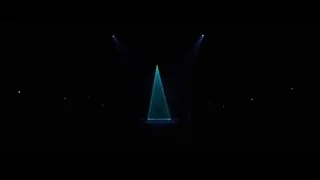 stage with large blue cone light — Creed 2