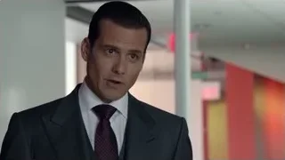 man in suit walking in hallway — Suits