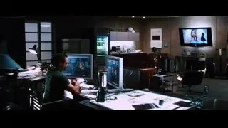 Man at office desk with TV screen — Iron Man