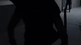 Man with futuristic device in dark room — The Avengers