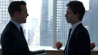 two men in suits looking at city skyline — Suits