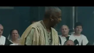 elderly man speaking to group — Gladiator 2