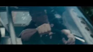 Black car driving on dirt road — Furious Seven