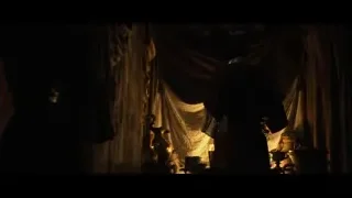 eerie dungeon-like room with lit candles — Gladiator