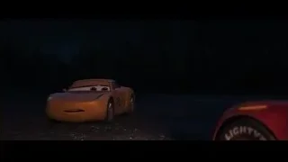 Lightning McQueen car driving on dirt road at night — Cars 3