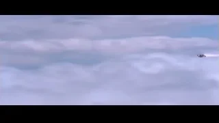 Iron Man flying in cloudy sky — Iron Man