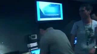 Men in control room looking at waveform screen — Elon Musk: Return to Space