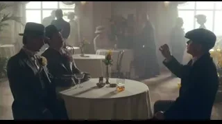 Three men in suits conversing in restaurant — Peaky Blinders