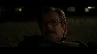 Man with mustache and glasses looking serious — Batman: The Dark Knight